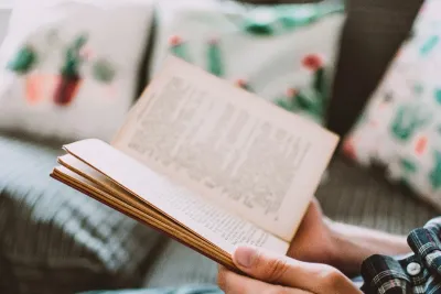 Person holding a book